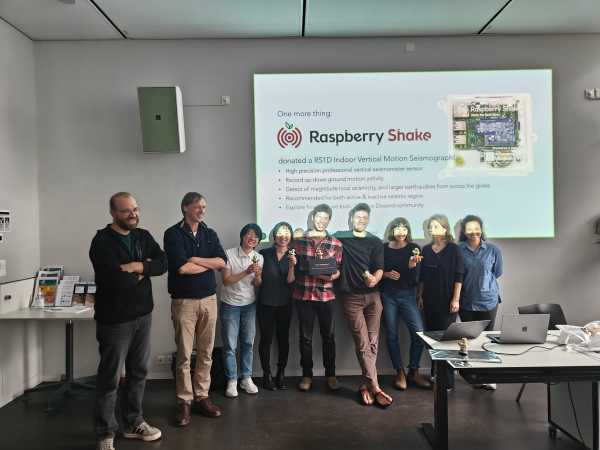 Photo of the winning team and jury members at ETH Zurich